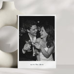 Black and White Minimalist Modern Photo Wedding Save The Date<br><div class="desc">This save the date card features a large black-and-white couple photo with a clean white border and understated serif typography. The reverse side includes a second photo, names in handwritten script, event details in small caps, and a personalized QR code linking to your wedding website. A natural fit for the...</div>
