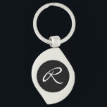Black and White Monogram Key Ring<br><div class="desc">Simple and chic, this design features a white monogram over a black background. It makes a great personalised gift. Edit the monogram with your initial. You can adjust the font and re-centre it to suit your monogram by using the "Customise It" feature. You can also change the black background to...</div>