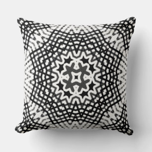 Black and white openwork geometric pattern cushion