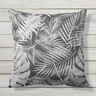 Black and white palm leaves cushion