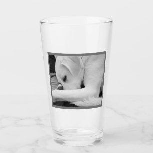 Black and White Photo of Cute Dog Resting with Dad Glass