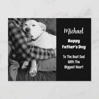 Black and White Photo of Dog Snuggling with Dad Holiday Postcard
