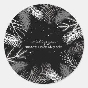 Black and white pine tree leaves with snow classic round sticker