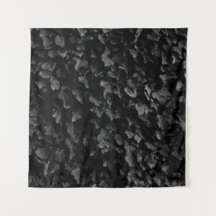 Black and white shot of thick ivy leaf plant tapestry