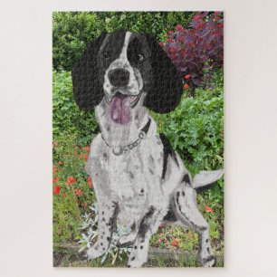 Black and White Springer Spaniel against a Flower Jigsaw Puzzle