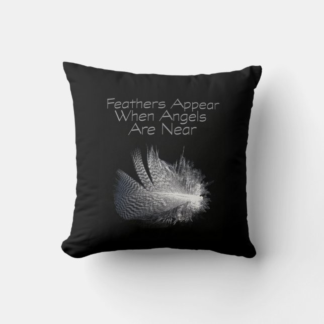 Black and White Striped Feather Floating on a Pond Cushion (Front)