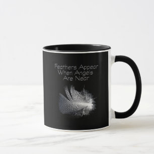 Black and White Striped Feather Floating on a Pond Mug