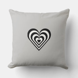 Black and white striped heart on light grey cushion