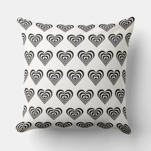 Black and white striped heart on white cushion