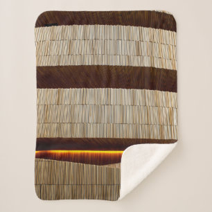 Black and white striped textile sherpa blanket