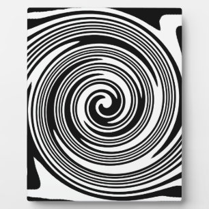 Black and white swirling pattern plaque