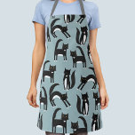 Black and White Tuxedo Cats Apron<br><div class="desc">Cute black and white tuxedo cats going about their business. A fun pattern on a mid blue background. Original art by Nic Squirrell.</div>