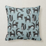 Black and White Tuxedo Cats Cushion<br><div class="desc">Cute black and white tuxedo cats going about their business. A fun pattern on a mid duck egg blue background,  perfect for animal and pet lovers.</div>