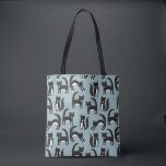 Black and White Tuxedo Cats Tote Bag<br><div class="desc">Cute black and white tuxedo cats going about their business. A fun pattern on a mid duck egg blue background,  perfect for animal and pet lovers.</div>