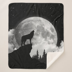 Black and white wolf howling at the moon sherpa blanket
