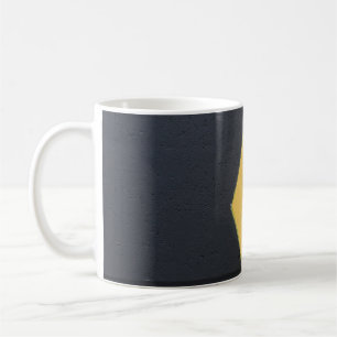 Black and yellow paint wall coffee mug
