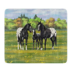 Black Appaloosa Horses In Summer Pasture Cutting Board