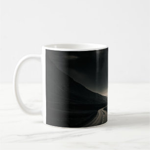 BLACK ASPHALT ROAD NEAR MOUNTAIN DURING DAYTIME COFFEE MUG