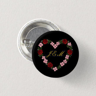 Black badge with a pink and red heart