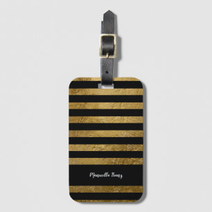 black bag tag with her name and faux gold stripes