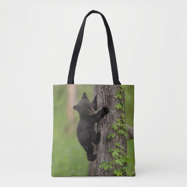 Black Bear Cub Climbing Tree Tote Bag (Front)