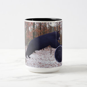 Black Bear Rolling a Feed Barrel In the Forest Mug