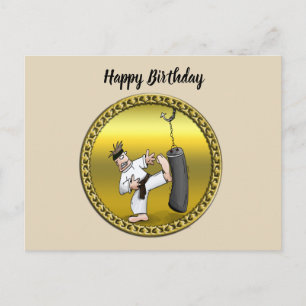 Black belt karate man kicking a black training bag postcard