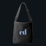 Black blue monogram initials elegant modern crossbody bag<br><div class="desc">A classic chic black background. Personalise and add your monogram initials written with light blue block letters. Modern,  trendy and simple.</div>