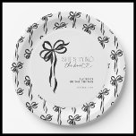 Black Bow She's Tying The Knot Bridal Shower Paper Plate<br><div class="desc">Set the tone for an effortlessly elegant bridal shower with these Black Bow She's Tying The Knot paper plates. Adorned with a delicate watercolor bow motif in soft black hues, this design brings a refined charm to your celebration. Perfect for serving sweet treats, hors d'oeuvres, or a full bridal brunch...</div>