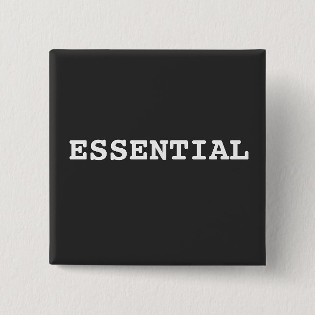Black Button That Says Essential (Front)