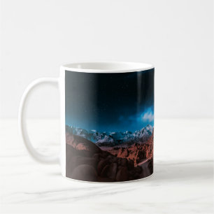 BLACK CAR NEAR ROCK FORMATIONS COFFEE MUG