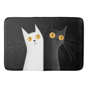Black Cat and White Cat on Black Bath Mat