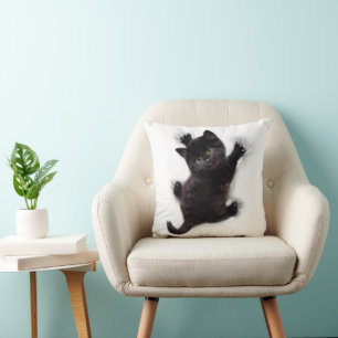 Black Cat Climbing On Human Back Cushion