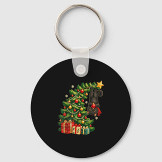 Black cat hanging from christmas tree festive pet key ring