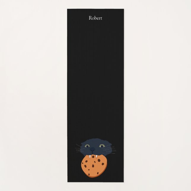 black cat holding a cookie in its teeth yoga mat (Front)