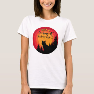 Black cat looks at sunset T-Shirt