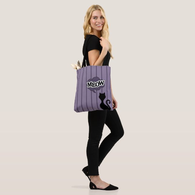 Black cat meows purple stripes tote bag (On Model)