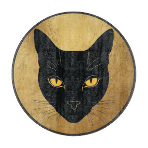 Black Cat Silhouette Against a Gold Circle Cutting Board