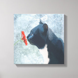 Black Cat Sniffing Flower Canvas Print