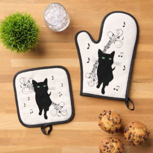Black Cat Surrounded by Whispering Notes of Music Oven Mitt & Pot Holder Set
