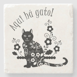 Black cat with flowers and Portuguese expression Stone Coaster