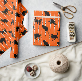 Black Cats and Birch Branches on Vibrant Orange Wrapping Paper