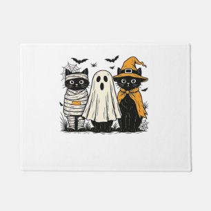 Black Cats in Halloween Costumes – Ghost, Witch, a Doormat