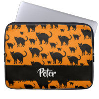 Black cats on orange