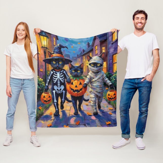 Black Cats Trick-or-Treating in Halloween Costumes Fleece Blanket (In Situ)