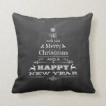 Black Chalkboard Wish You a Merry Christmas Tree Cushion<br><div class="desc">A trendy, black chalkboard background shows off a typographic design forming the shape of a Christmas tree on this pillow. The verse "We wish you a merry Christmas and a happy New Year" is rendered in various type forms combined with seasonal icons and ornaments to create the tree shape and...</div>