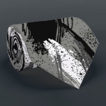 Black Charcoal Grey White Camouflage Neck Tie<br><div class="desc">Men's tie features a modern camouflage pattern in black,  charcoal,  grey and white. MORE designs in store. Cool for the office,  a night on the town,  a wedding,  for the groom or groomsmen or give as a gift to your husband,  dad,  brother or best friend. Make a statement!</div>