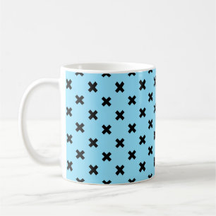 Black cross stitches on baby blue coffee mug