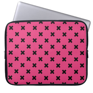 Black cross stitches on fuchsia laptop sleeve