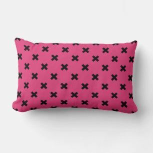 Black cross stitches on fuchsia lumbar cushion